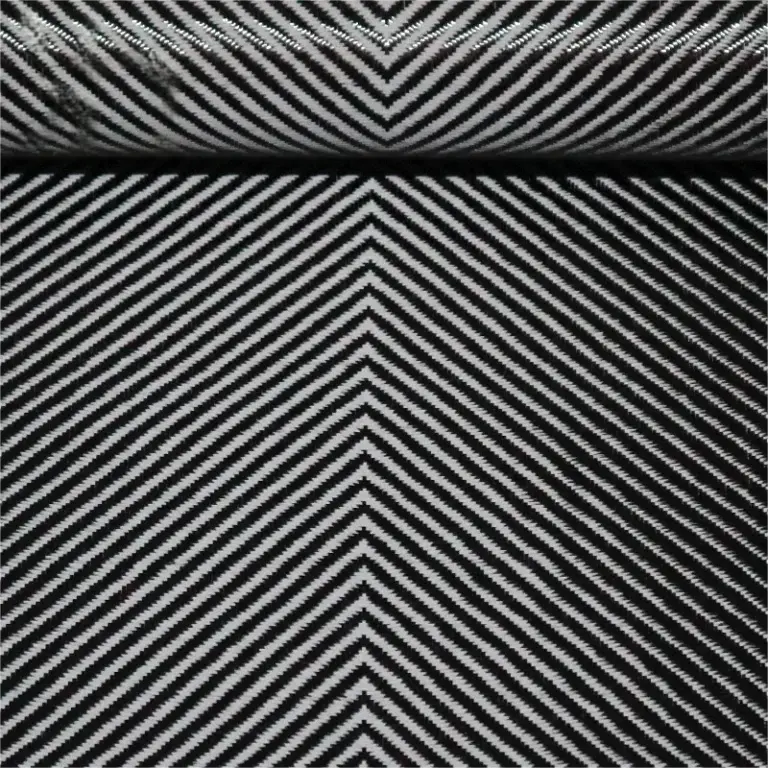 Chevron-pattern woven carbon fiber fabric close-up