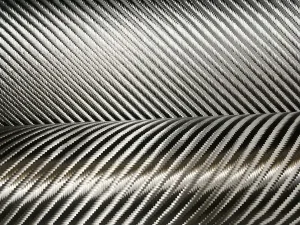 Black 2x2 twill carbon fiber fabric close-up