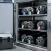 Sealed carbon fiber prepreg rolls stored in an industrial cold cabinet