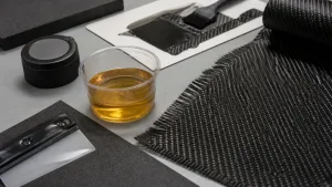 Epoxy resin and carbon fiber fabric prepared for a controlled layup