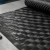 Spread tow carbon fiber fabric on a composites workbench